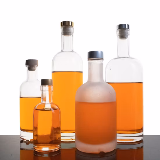 卸売 700 ミリリットル 750 ミリリットル 500 ミリリットルクリアラウンド空ラムウイスキース​​ピリットジンウォッカガラス酒ボトルコルク栓付き